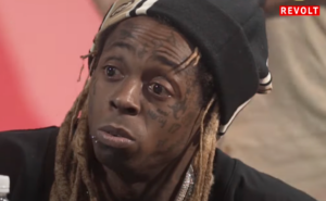 Rapper Lil Wayne CAUGHT ON VIDEO ... Appearing To S**k on Madonna's 64 ...